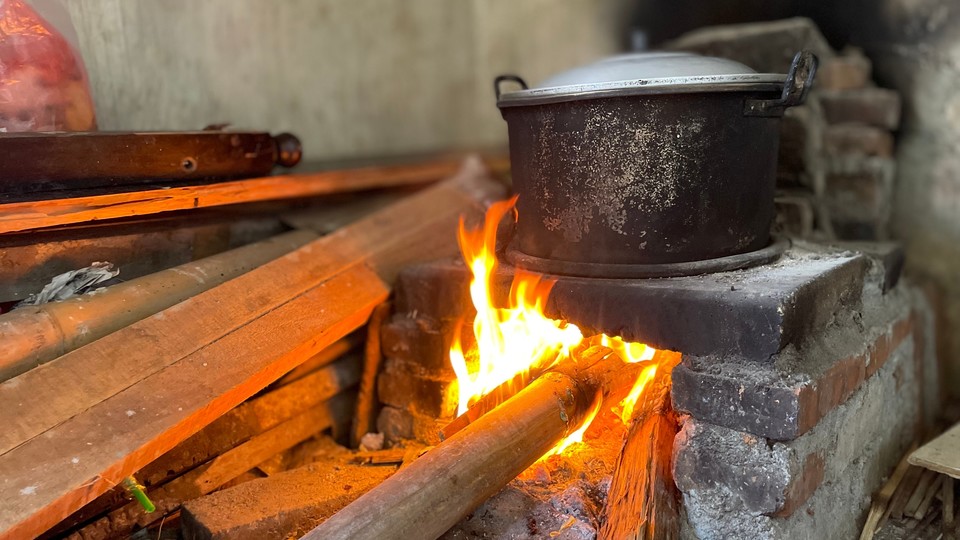 Black pot on indoor fire
