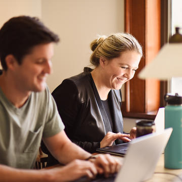 woman and man working together